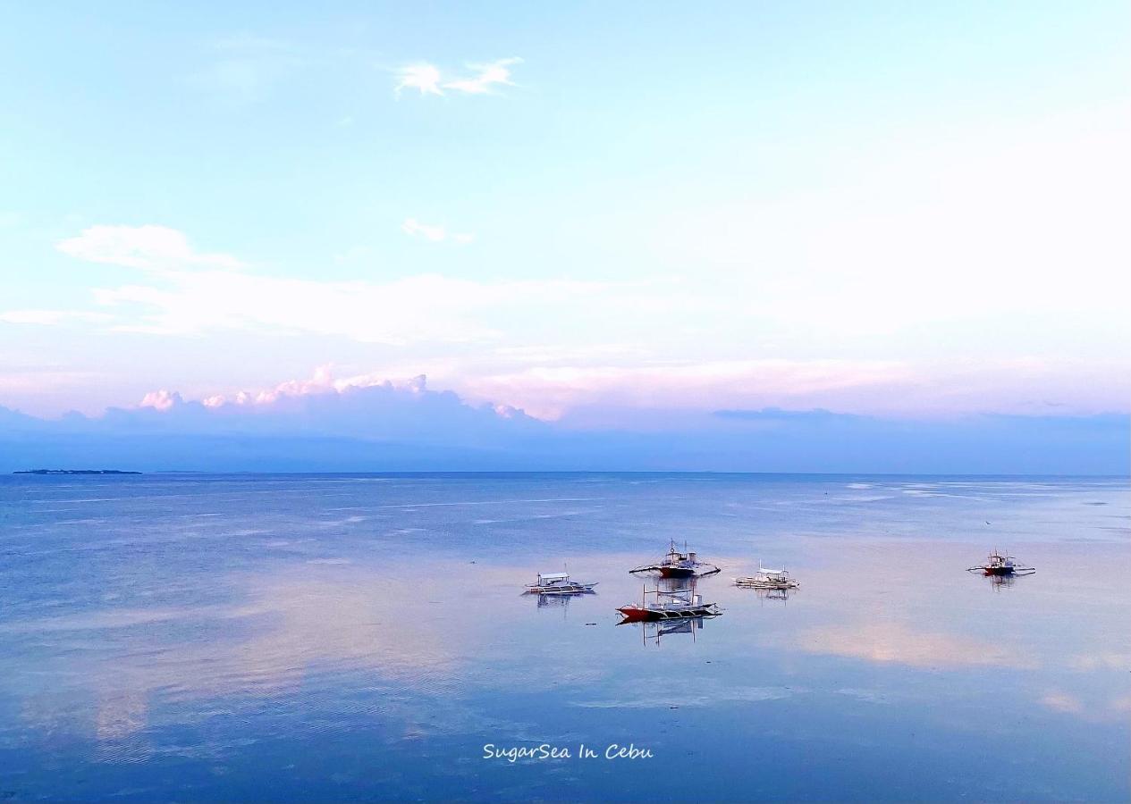 Sugarsea Inn & Dive Shop Мактан Экстерьер фото