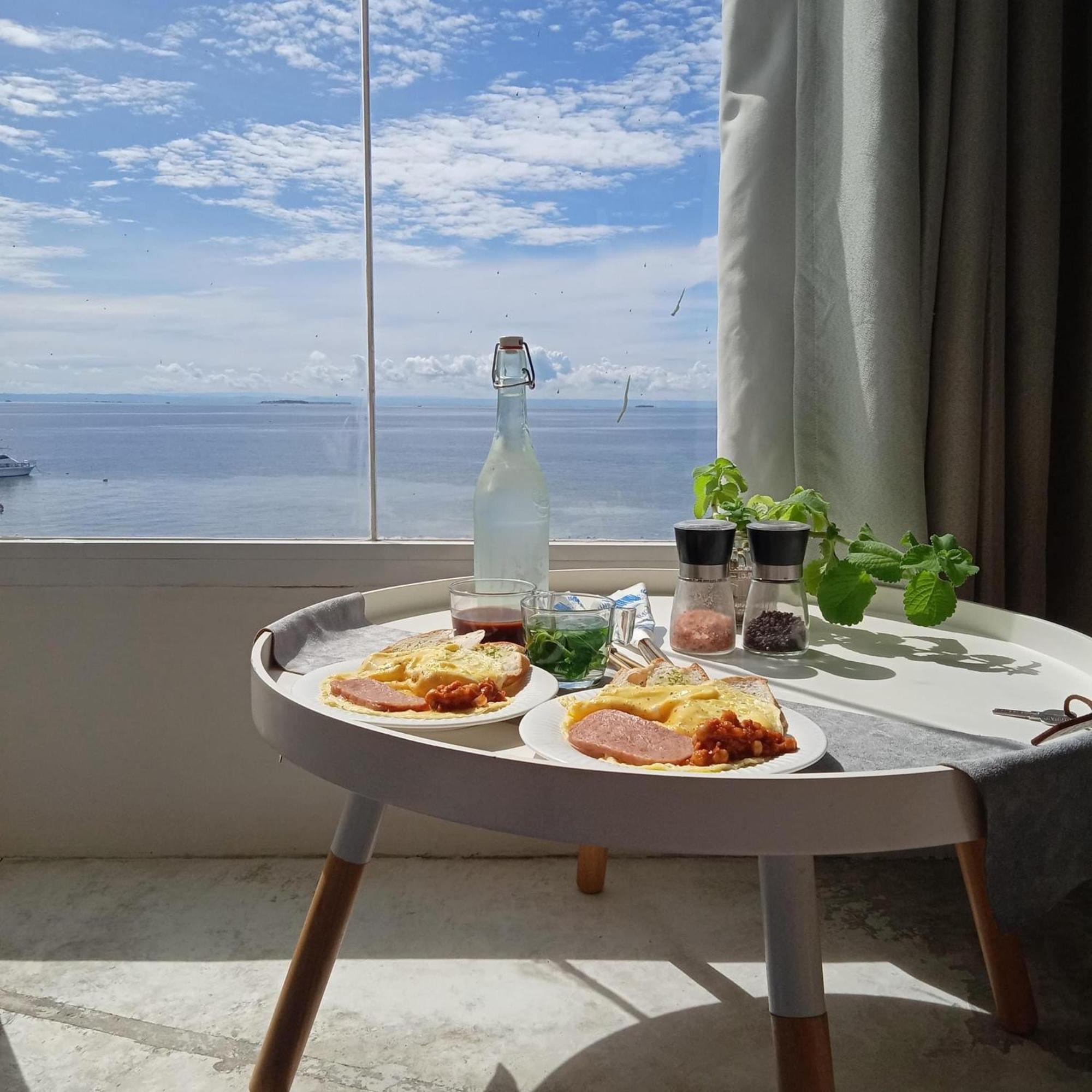 Sugarsea Inn & Dive Shop Мактан Номер фото